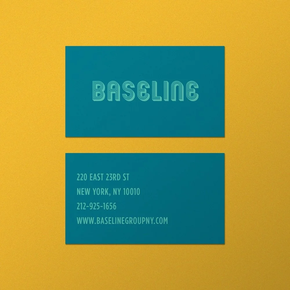 A business card with the company name 'Baseline' against a yellow background.